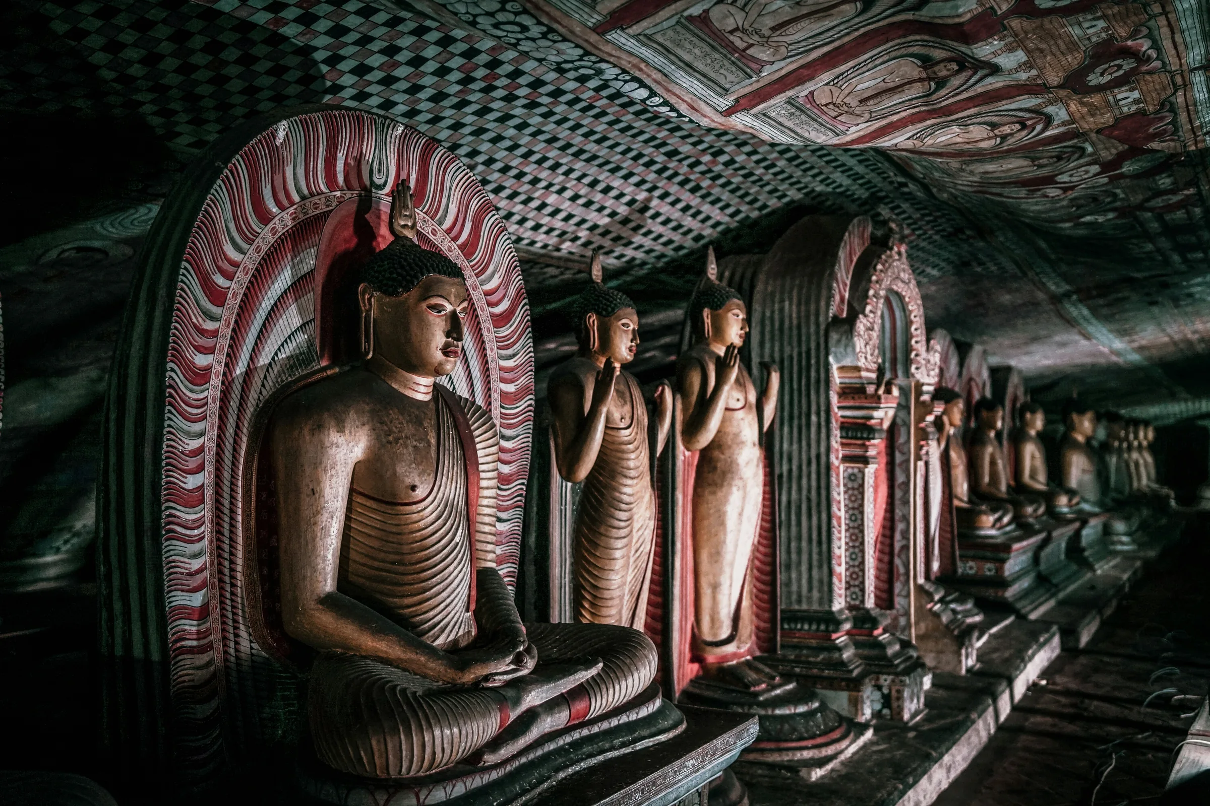 Ancient Buddha statues inside Dambulla cave temple